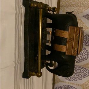 Vintage cast iron cigarette dispenser